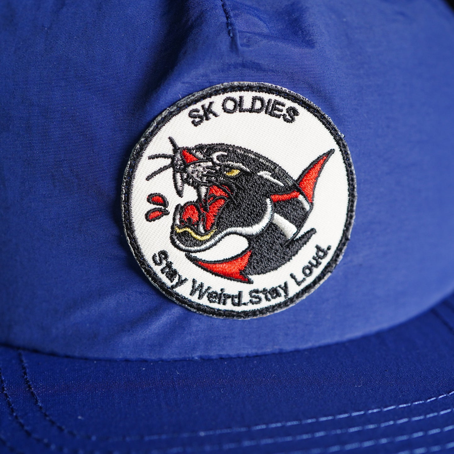 SK OLDIES  Snap Back Cap "Stay Weird.Stay Loud."